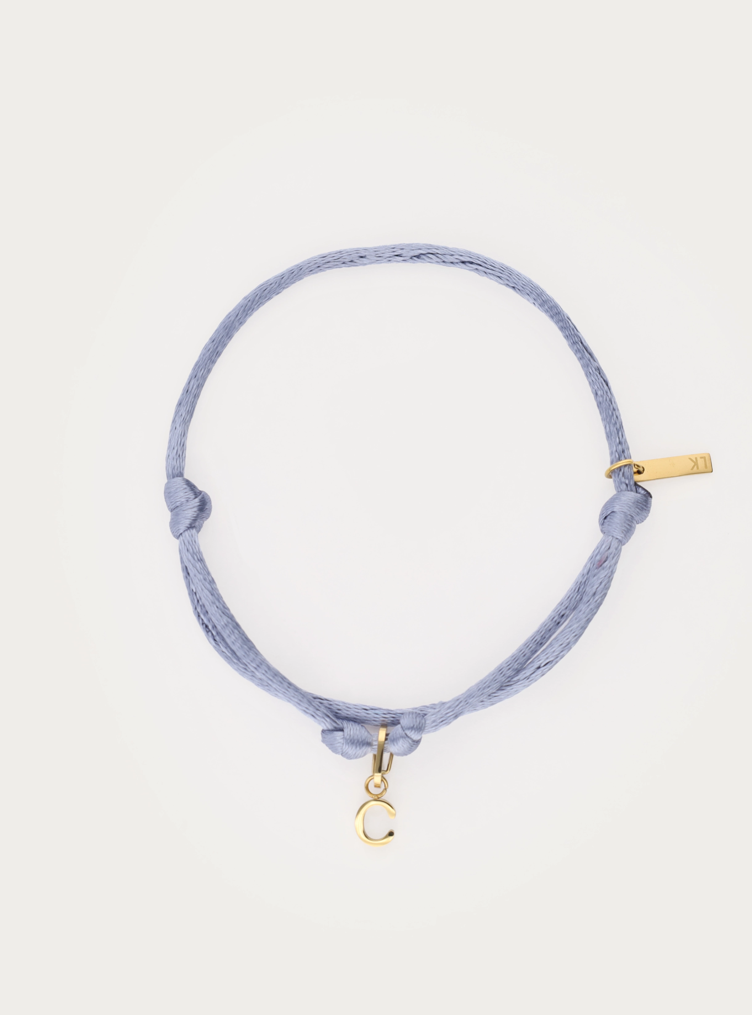Armbandje van touw in satijn look met initiaal