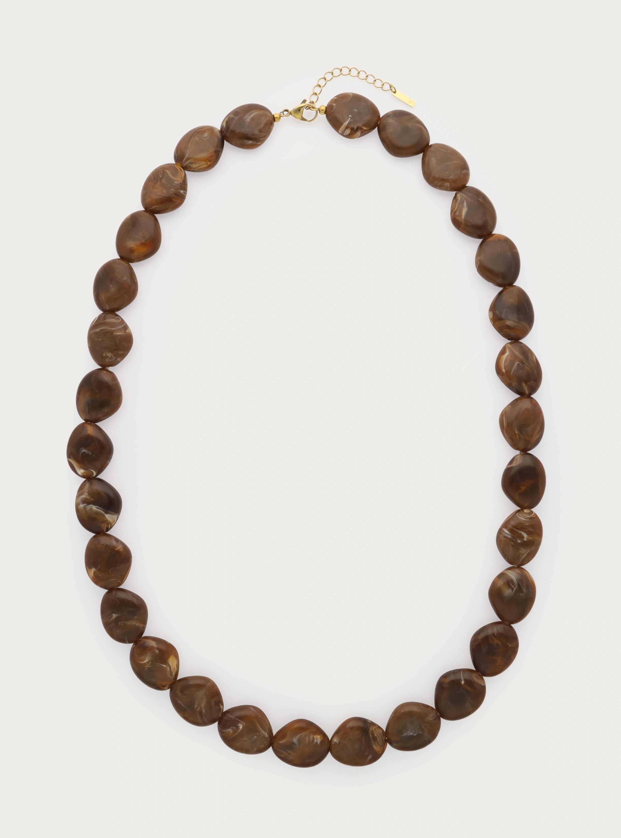 Lange statement ketting van acryl kralen in bruin - 23 x 19 mm