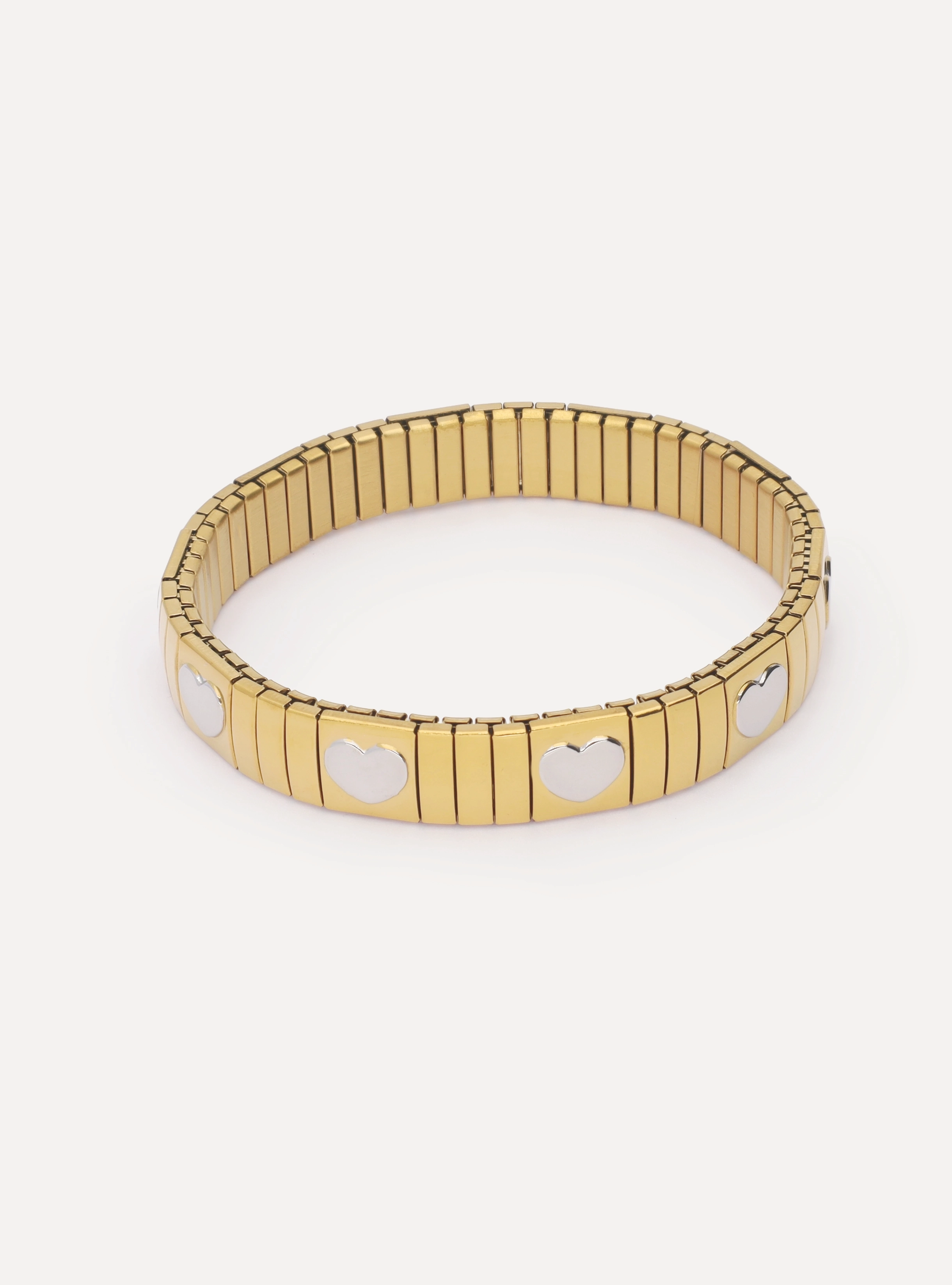 Stretch armband met zilveren hartjes